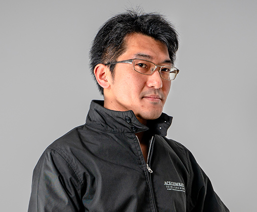 山本 治由